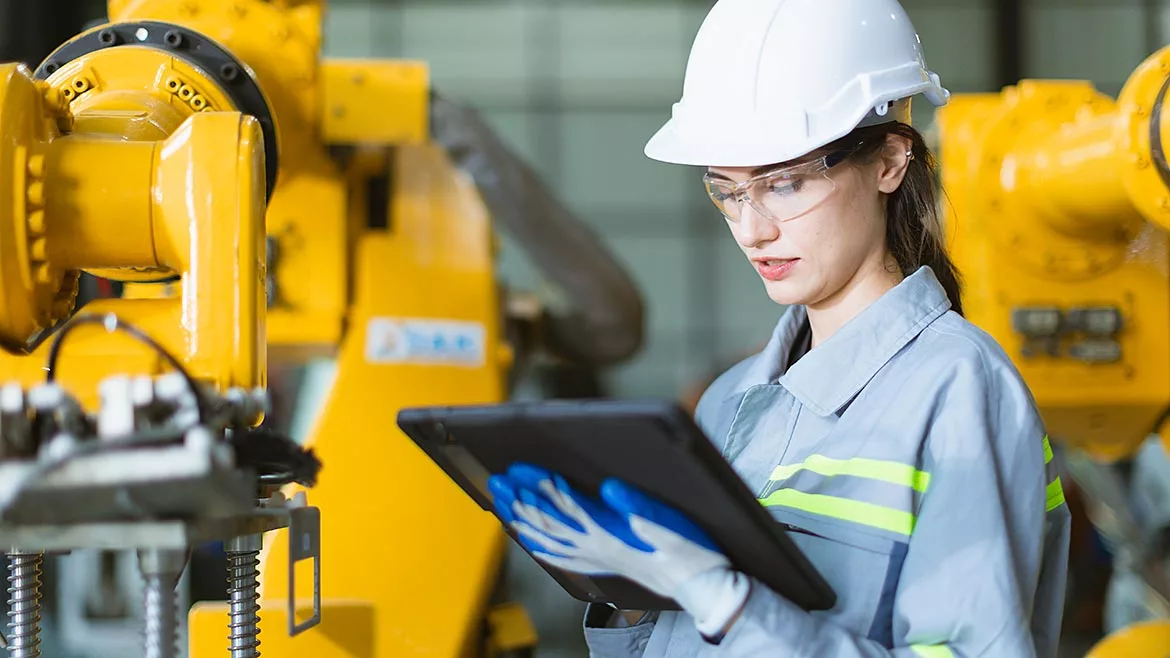 Engineer performing quality control inspection